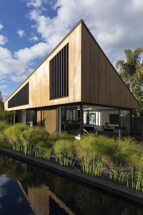 S House modern residence 4 S Shaped Family Residence Flanked by Gardens in New Zealand