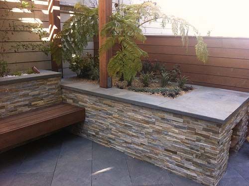 Mid-centruy raised planter with tree fern Mid-centruy raised planter with tree fern